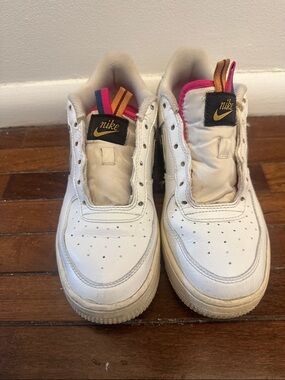 Nike White Leather Sneakers with Pink & Yellow Pull Tabs